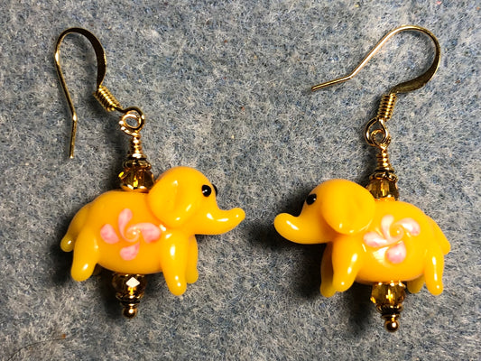 Yellow amber lamp work elephant bead earrings adorned with amber Chinese crystal beads.