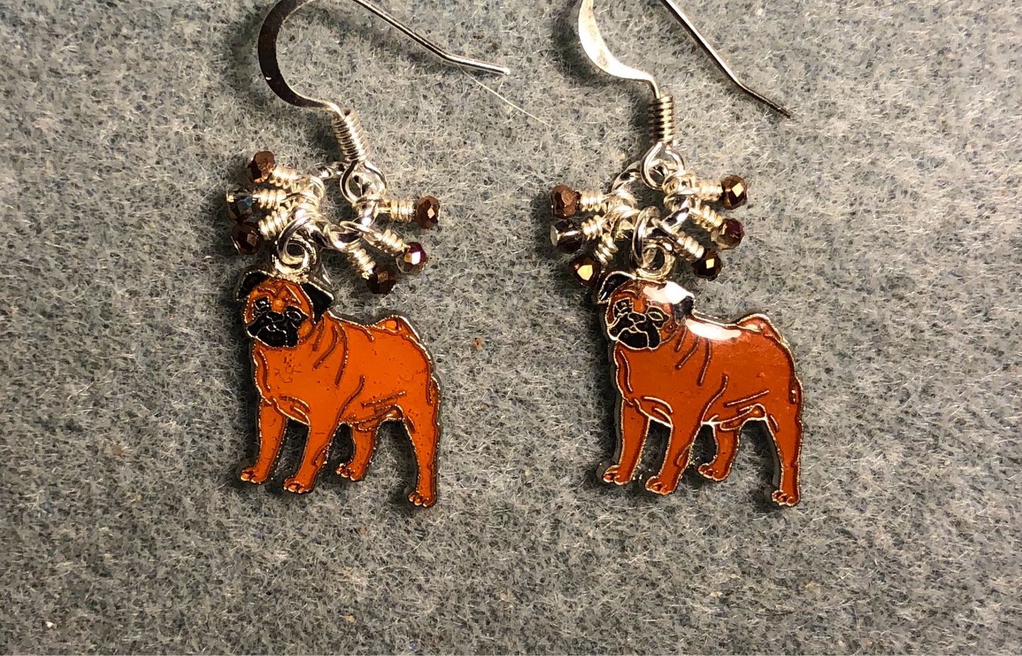 Small brown and black enamel bulldog charm earrings adorned with tiny dangling brown and black Chinese crystal beads.