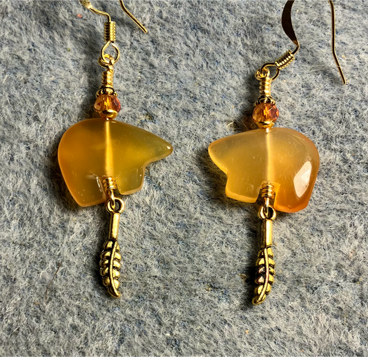 Carnelian gemstone Zuni bear fetish bear earrings adorned with orange crystal beads and tiny gold feather charms.