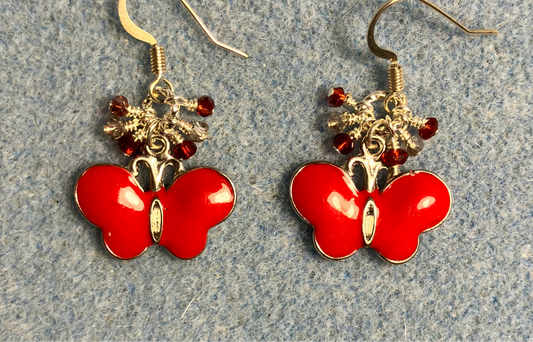 Red and silver enamel butterfly charm earrings adorned with tiny dangling red and clear Chinese crystal beads.