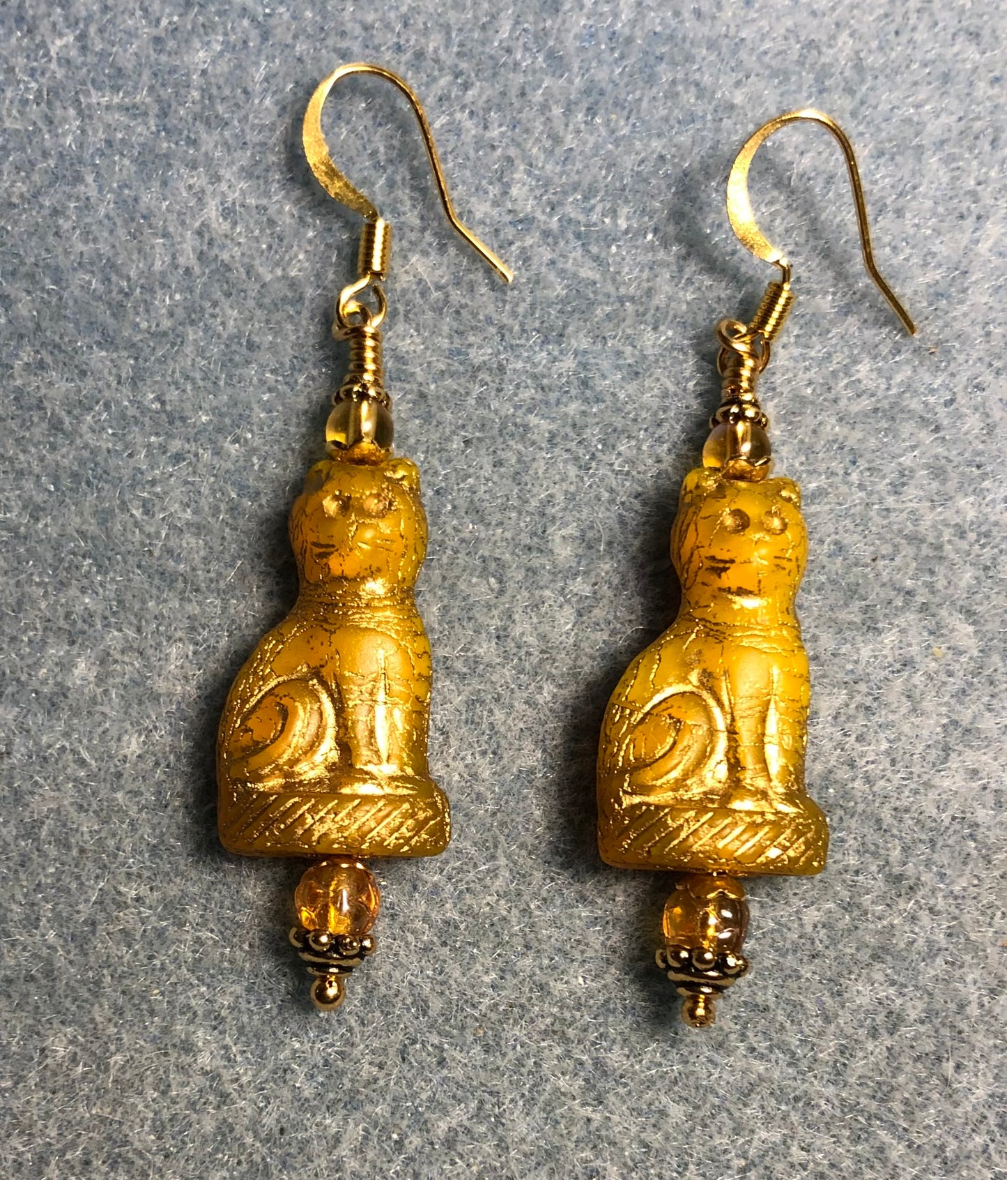 Topaz (with gold inlay) fancy Czech glass cat bead earrings adorned with topaz Czech glass beads.