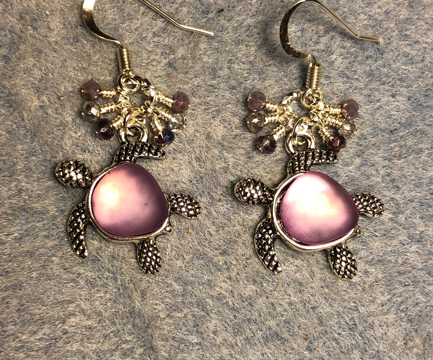 Silver and light violet fiber optic turtle charm earrings adorned with tiny dangling violet and silver Chinese crystal beads.