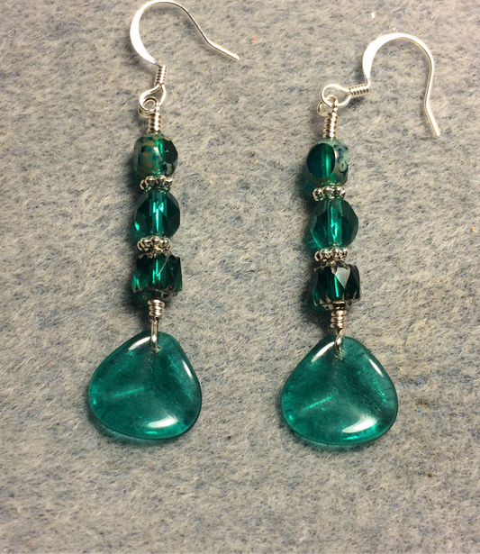 Translucent teal Czech glass rose petal earrings adorned with teal Czech glass beads.