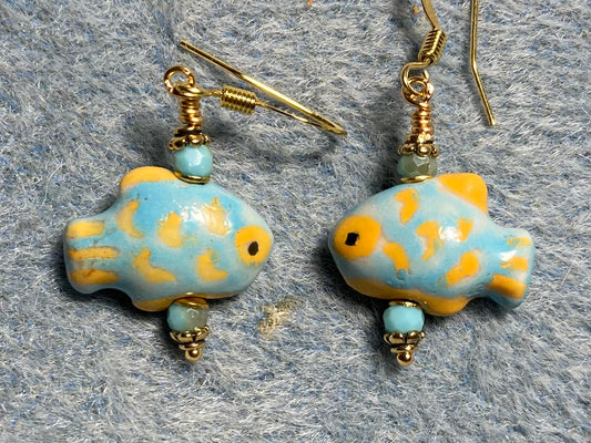 Small aqua and tangerine ceramic fish bead earrings adorned with opaque aqua Chinese crystal beads.