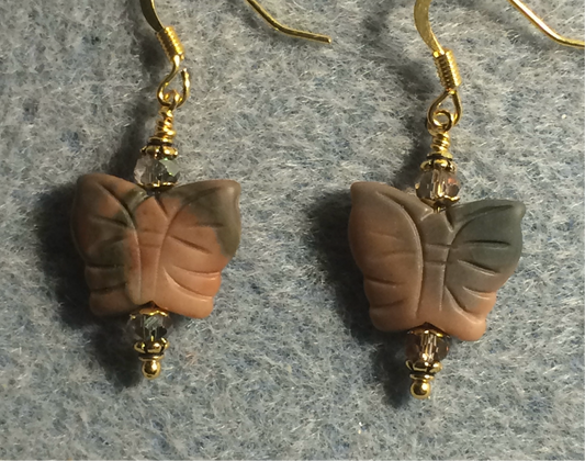 Pink and green coffee jasper gemstone butterfly bead earrings adorned with pinkish green Chinese crystal beads.