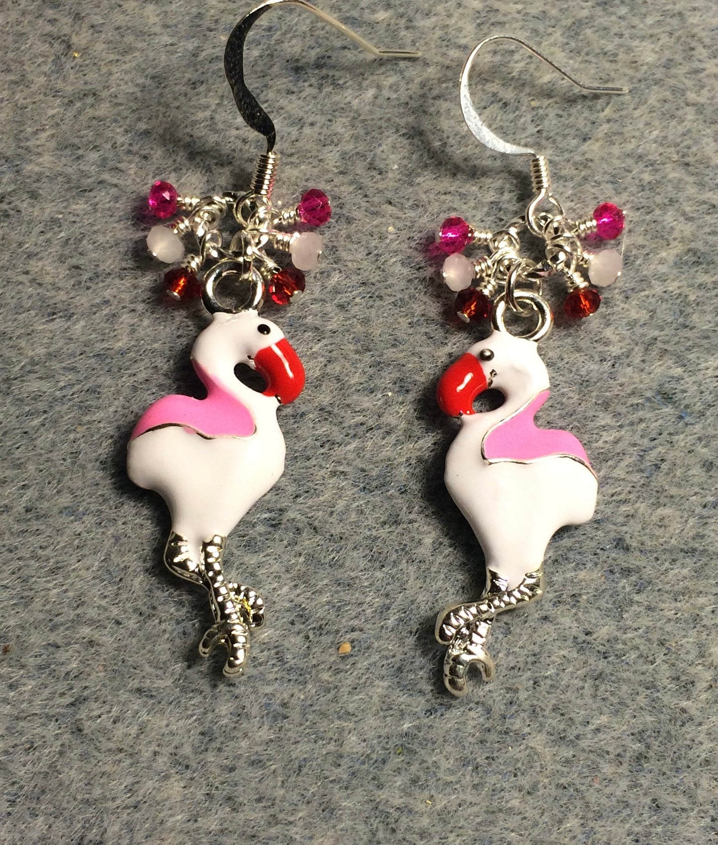 Pink, white, and red enamel flamingo charm earrings adorned with tiny dangling pink, white, and red Chinese crystal beads.