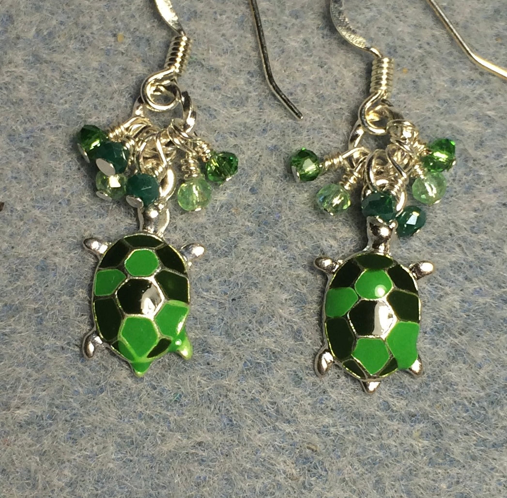 Bright green and dark green enamel turtle charm earrings adorned with tiny dangling bright green and dark green Chinese crystal beads.