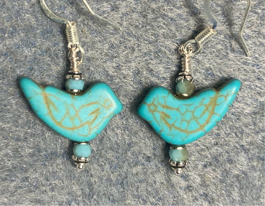 Turquoise howlite gemstone bird bead earrings adorned with turquoise Chinese crystal beads.
