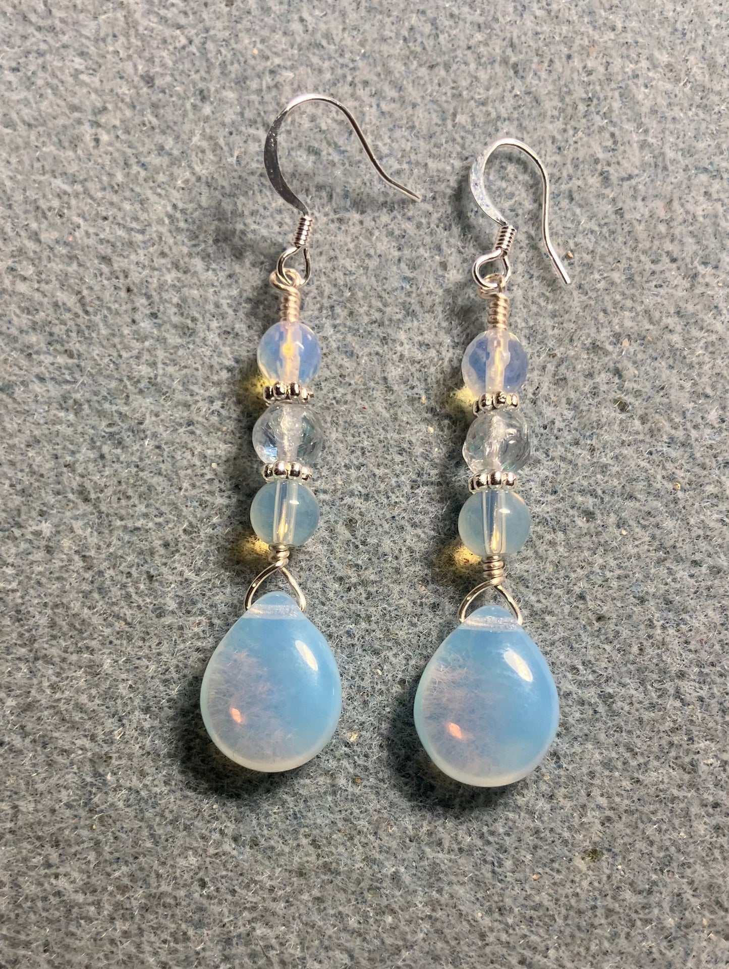 Opal white Czech glass pear drop bead earrings adorned with opal white Czech glass beads.
