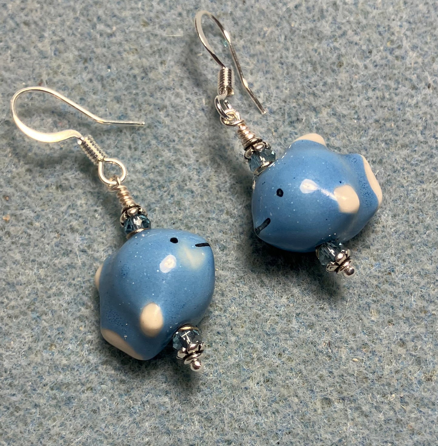 Small blue ceramic fish bead earrings adorned with blue Chinese crystal beads.