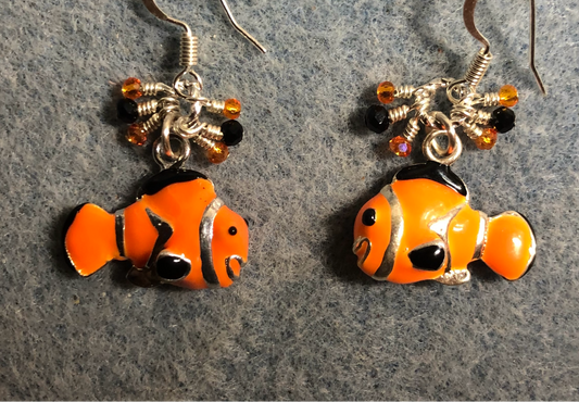Orange and black enamel clownfish charm earrings adorned with tiny dangling orange and black Chinese crystal beads.
