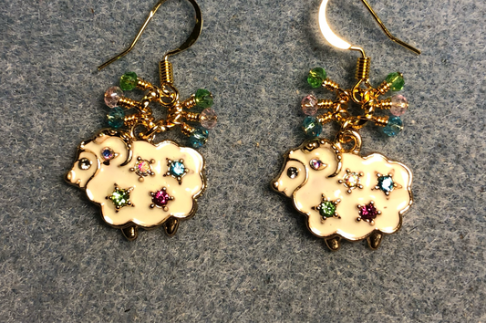 Off white enamel and colored rhinestone sheep charm earrings adorned with tiny dangling green, pink, and aqua Chinese crystal beads.