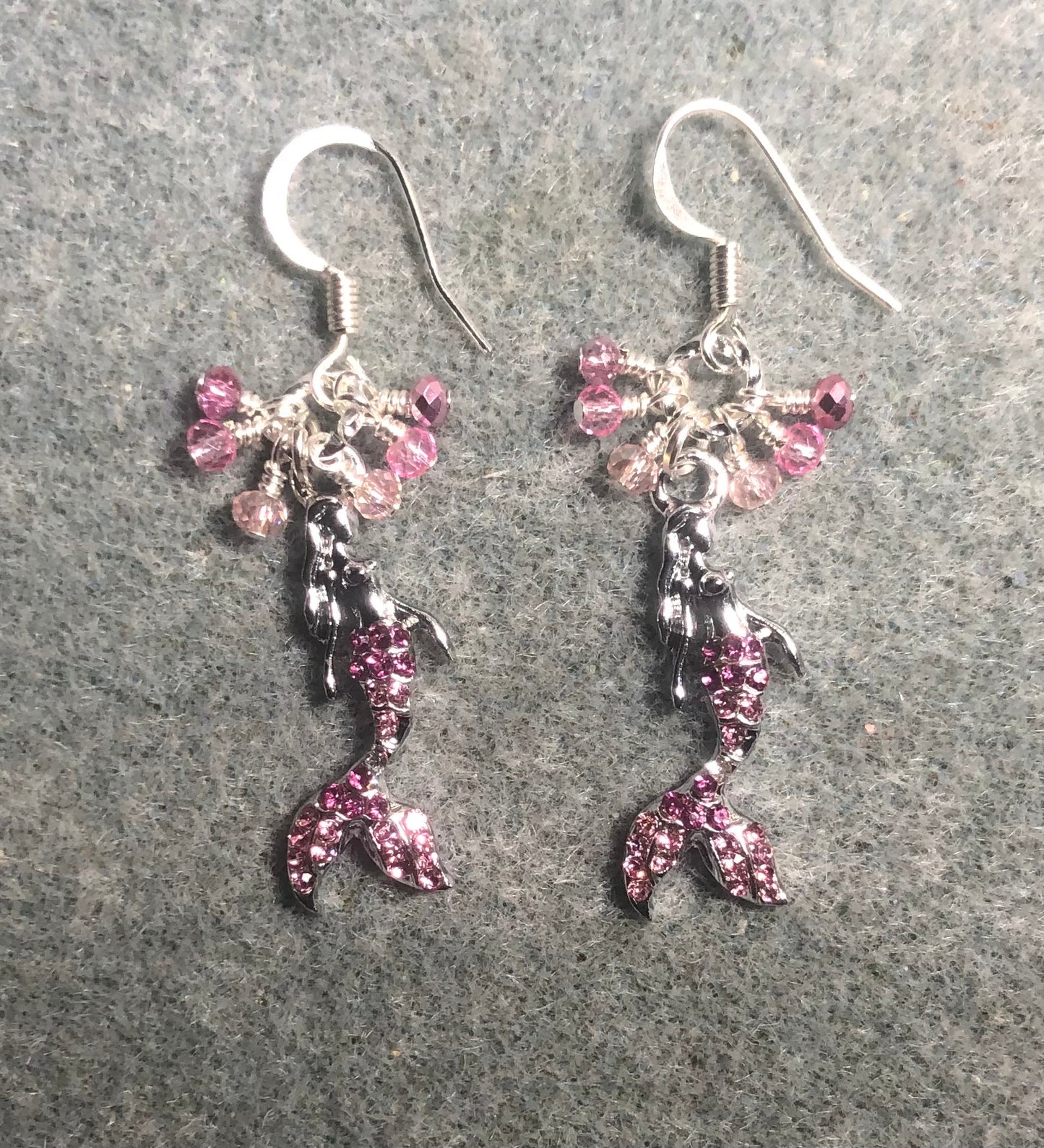Silver and pink rhinestone mermaid charm earrings adorned with tiny dangling light pink and mauve pink Chinese crystal beads.