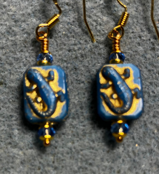 Small blue and gold Czech glass lizard bead earrings adorned with blue Chinese crystal beads.