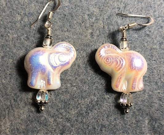 Shimmery white Czech glass elephant bead earrings adorned with clear Czech glass beads.