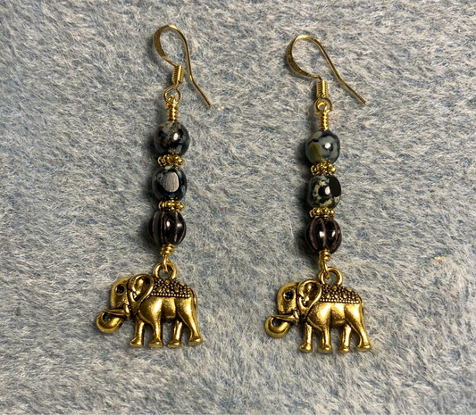 Gold elephant charm earrings adorned with black Picasso Czech glass beads