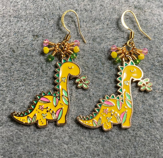 Yellow, pink, and green enamel dinosaur charm earrings adorned with yellow, pink, and green Chinese crystal beads