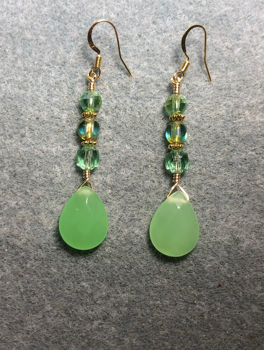 Light milky green Czech glass briolette bead earrings adorned with light green Czech glass beads.