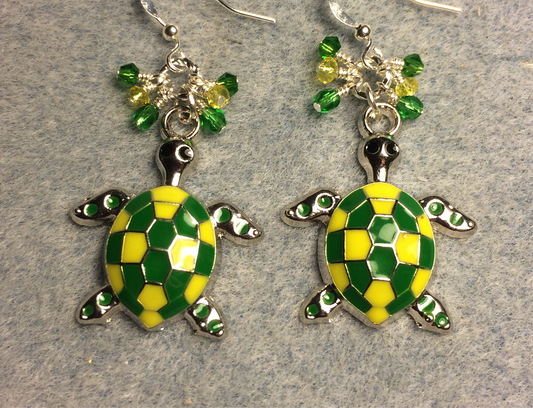 Large green and yellow enamel turtle charm earrings adorned with small dangling green and yellow Chinese crystal beads.