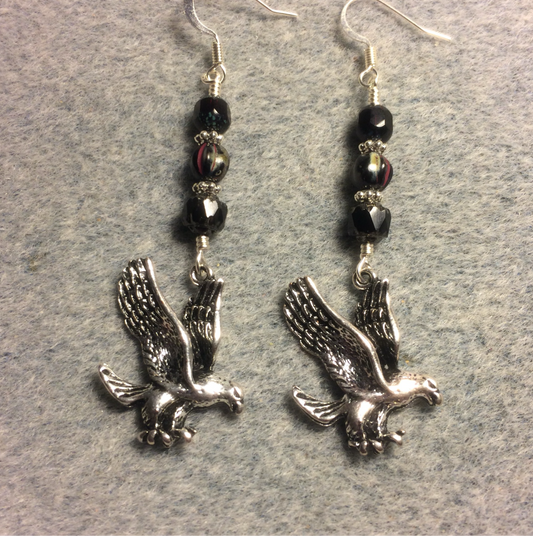 Silver flying eagle charm earrings adorned with black Czech glass beads