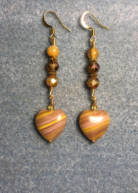 Opaque striped caramel Czech glass heart bead earrings adorned with light caramel Czech glass beads.