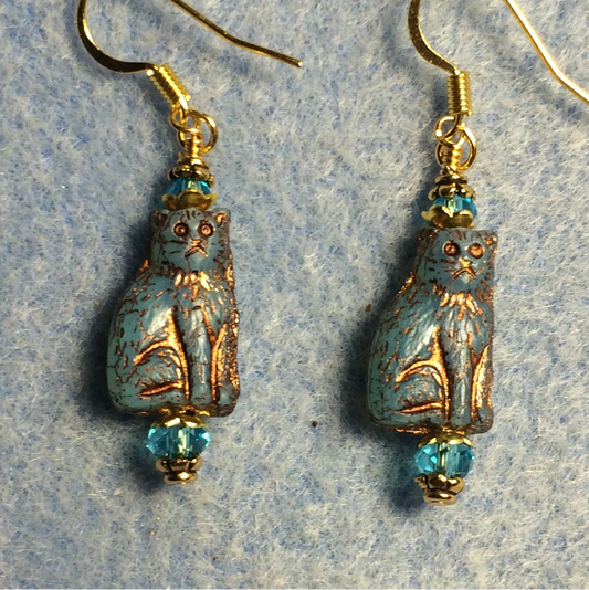 Small light turquoise (with copper inlay) Czech glass cat bead earrings adorned with turquoise Chinese crystal beads.