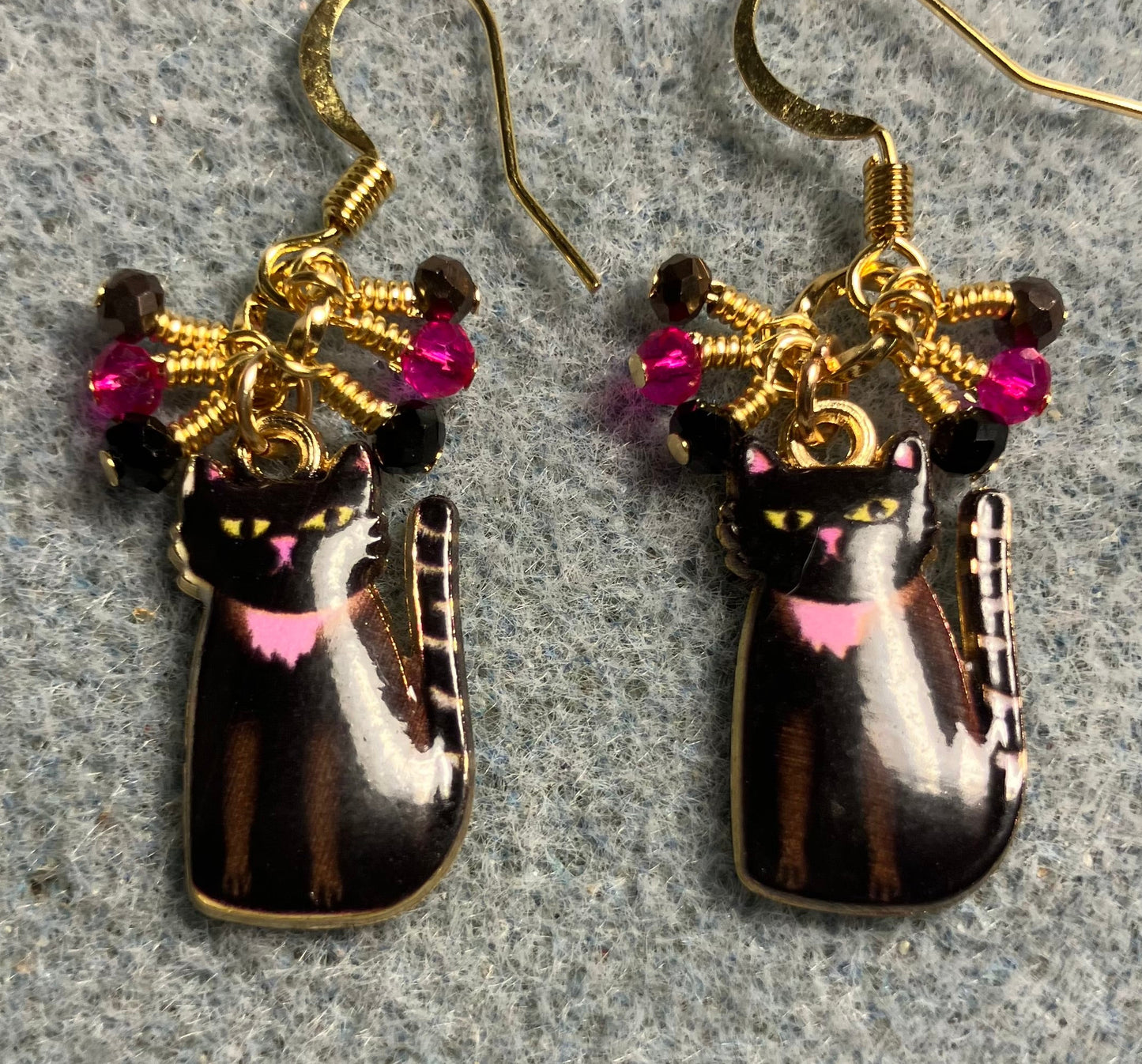Black, brown, and pink enamel cat charm earrings adorned with tiny dangling black, brown, and pink Chinese crystal beads.