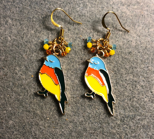 Aqua, yellow, and orange enamel songbird charm earrings adorned with tiny dangling aqua, yellow, and orange Chinese crystal beads.