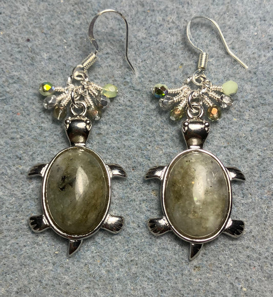 Large silver and green agate gemstone turtle charm earrings adorned with small dangling green and silver Czech glass beads.