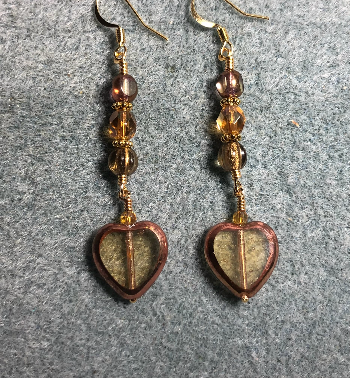 Amber gold Czech glass heart bead earrings adorned with amber gold Czech glass beads.