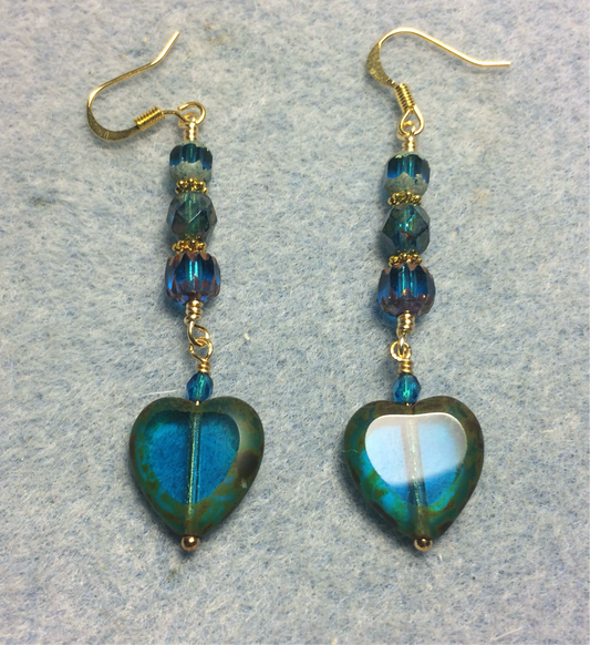 Blue green Czech glass heart bead earrings adorned with blue green Czech glass beads.