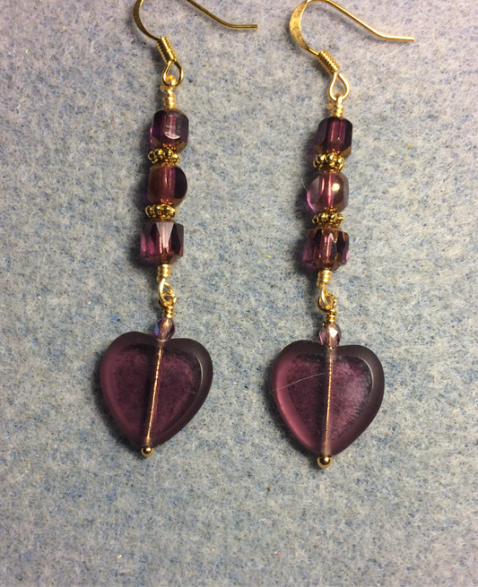 Translucent violet Czech glass heart bead earrings adorned with violet Czech glass beads.