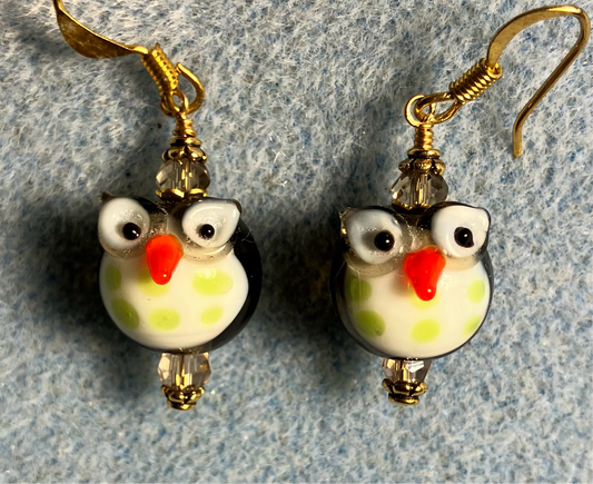 Small charcoal gray and green lamp work owl bead earrings adorned with gray Chinese crystal beads.