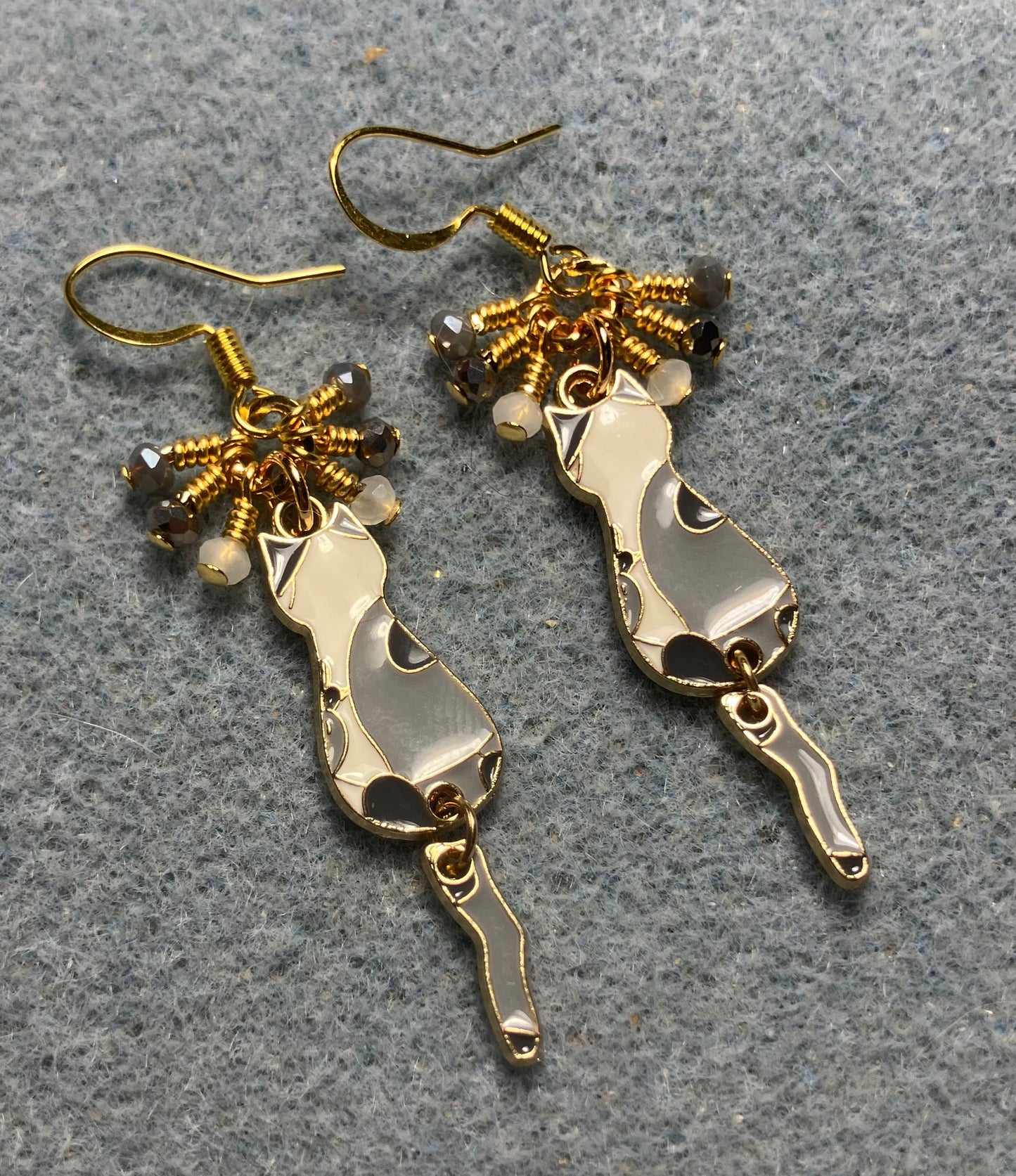 Dark gray , light gray, and white enamel cat charm earrings adorned with tiny dangling dark gray, light gray, and white Chinese crystal beads.