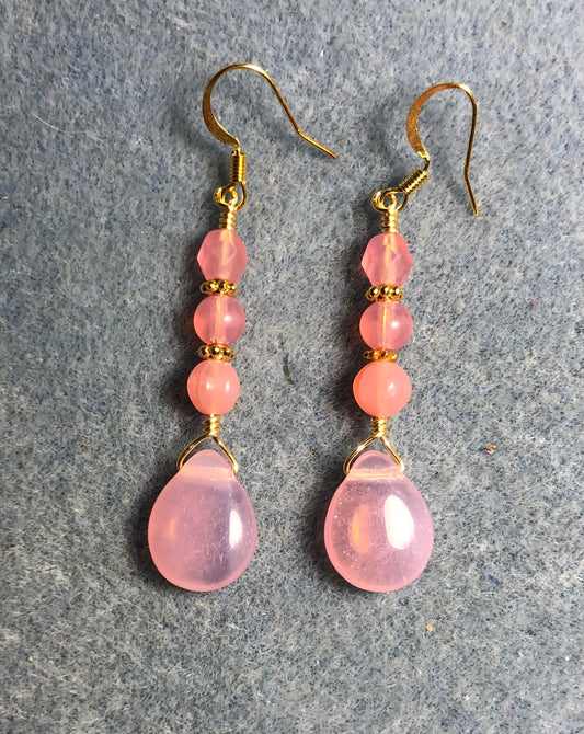 Milky pink Czech glass pear drop bead earrings adorned with milky pink Czech glass beads.