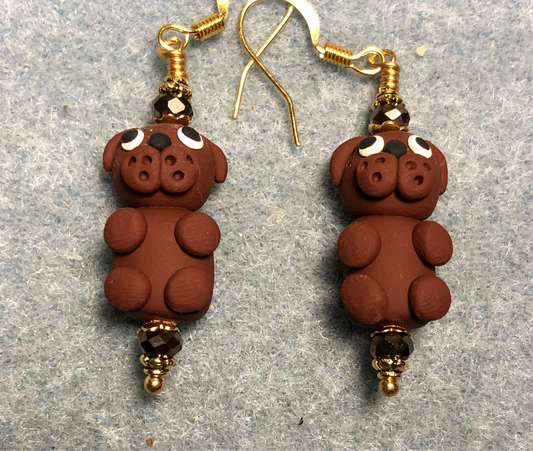 Brown polymer clay puppy dog bead earrings adorned with brown Chinese crystal beads.