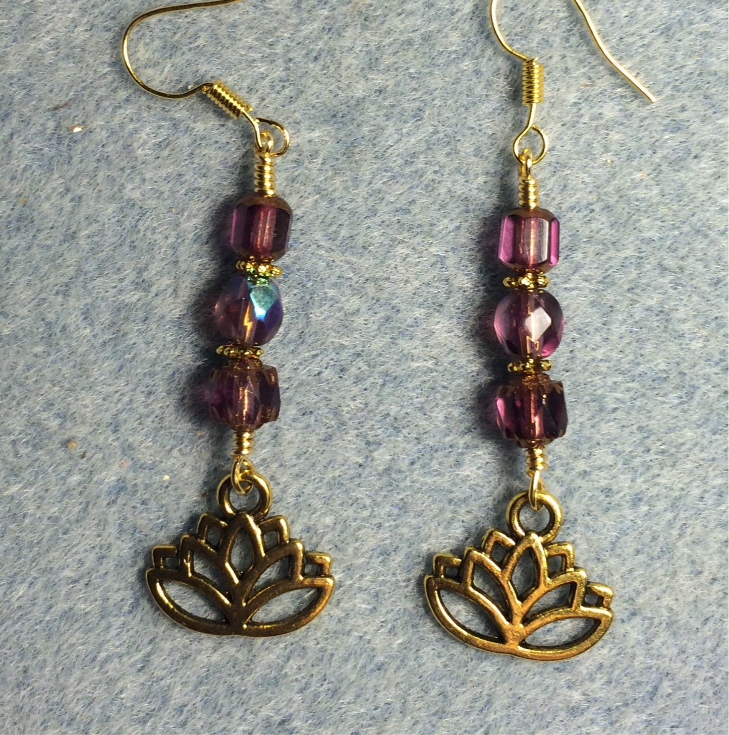 Gold lotus flower charm earrings adorned with purple violet Czech glass beads