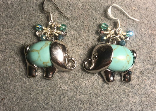 Large silver and light turquoise gemstone elephant charm earrings adorned with small dangling light turquoise and silver Czech glass beads.