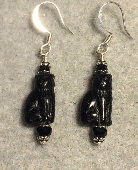 Small opaque black Czech glass cat bead earrings adorned with black Chinese crystal beads.