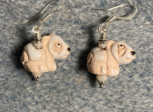 Small beige and white ceramic polar bear bead earrings adorned with white Chinese crystal beads.