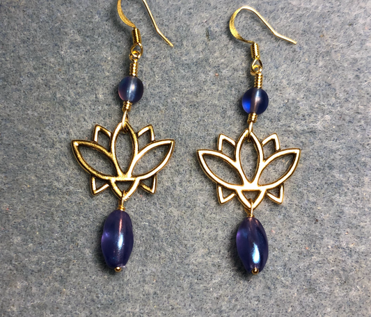 Gold lotus flower connector charm earrings adorned with metallic purple Czech glass drop beads and purple Czech glass melon beads.