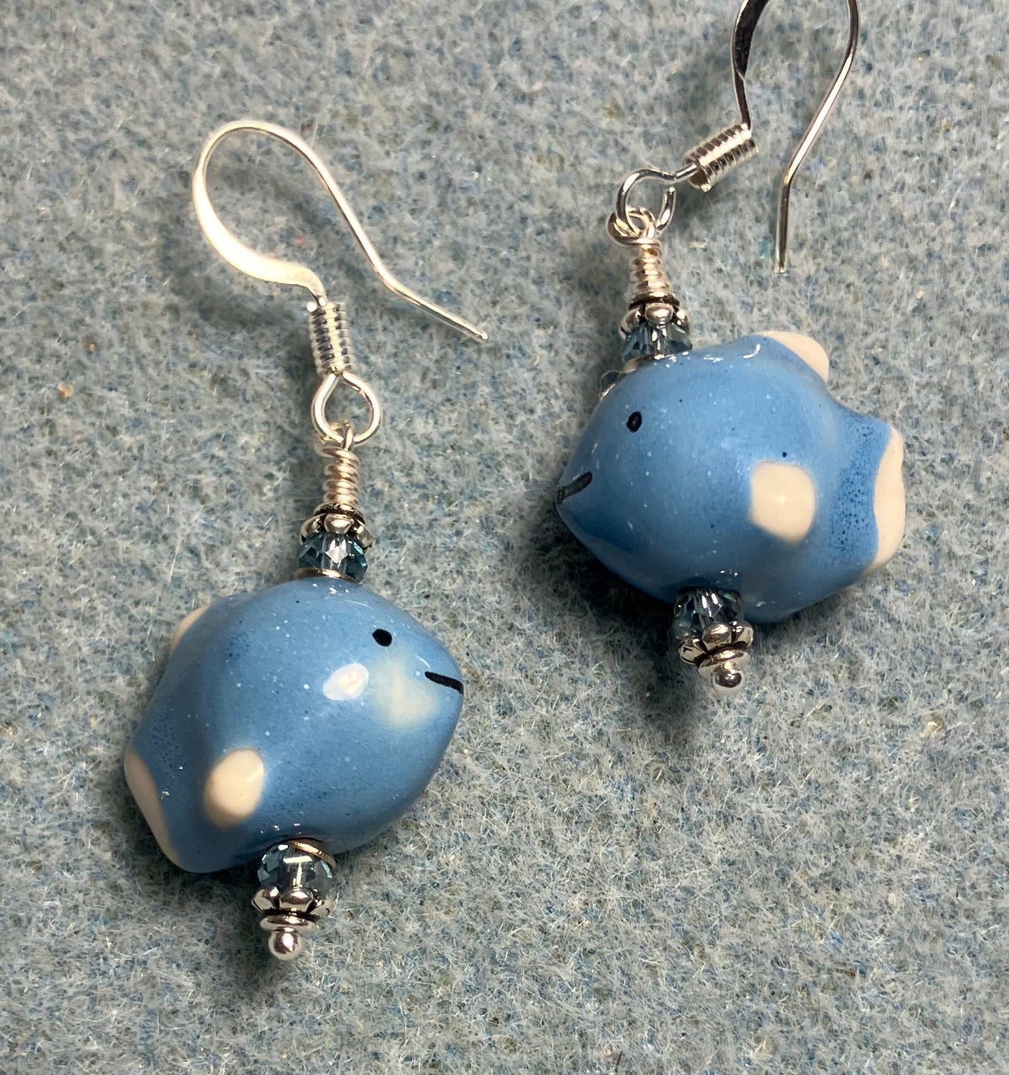 Small blue ceramic fish bead earrings adorned with blue Chinese crystal beads.