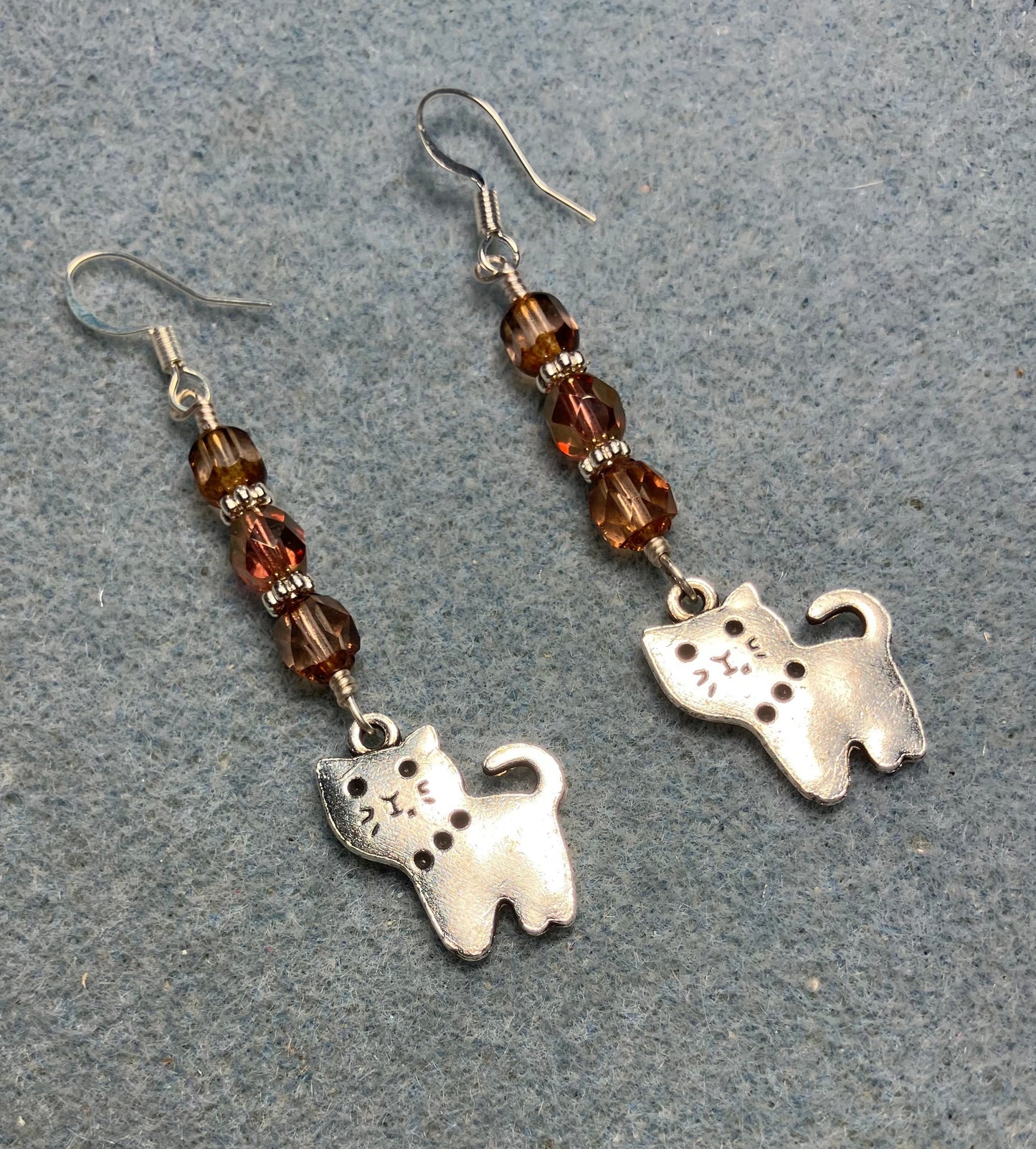 Silver cat charm earrings adorned with rose gold Czech glass beads