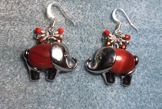 Large silver and red poppy jasper gemstone elephant charm earrings adorned with small dangling orange and silver Czech glass beads.