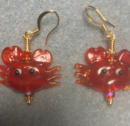 Red lamp work crab bead earrings adorned with red Chinese crystal beads.