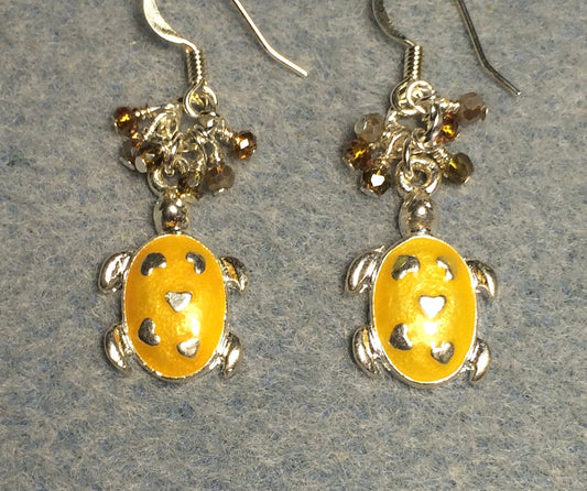 Silver and tangerine enamel turtle charm earrings adorned with tiny dangling tangerine and orange Chinese crystal beads.