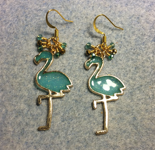 Large gold and teal resin flamingo charm earrings adorned with tiny dangling teal and gold Chinese crystal beads.