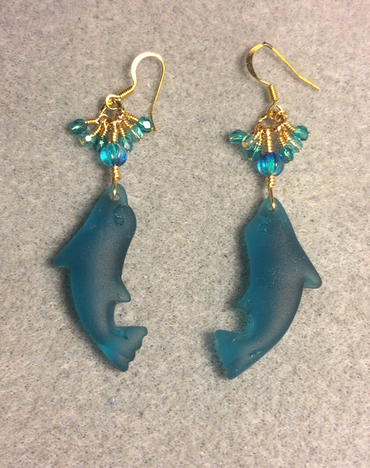 Dark turquoise sea glass dolphin pendant bead earrings adorned with dark turquoise Czech glass beads and tiny dangling dark turquoise Czech glass beads.
