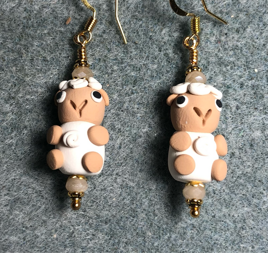 Tan and white polymer clay sheep bead earrings adorned with tan Chinese crystal beads.