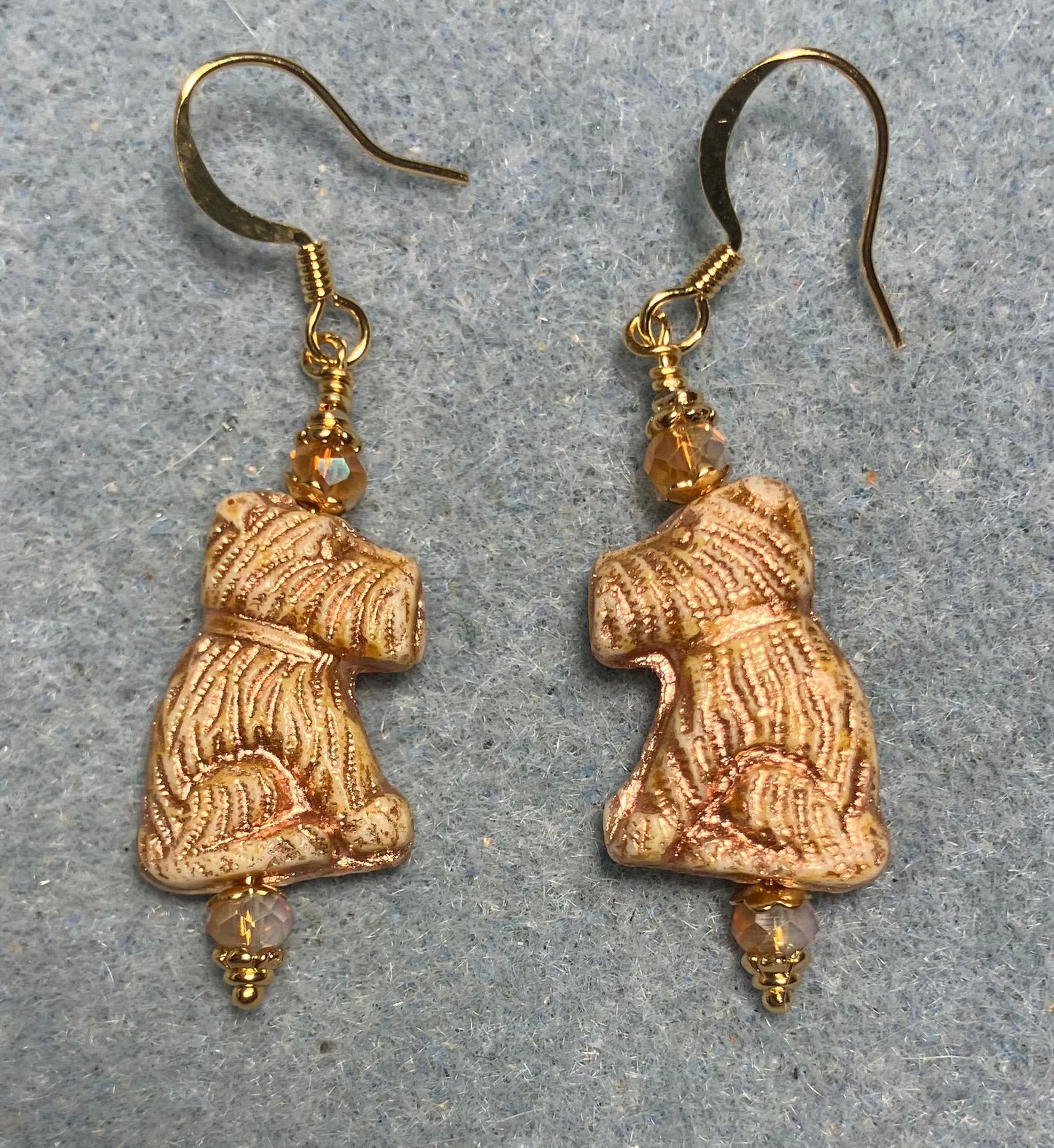 Gold Czech glass Schnauzer bead earrings adorned with gold Chinese crystal beads.